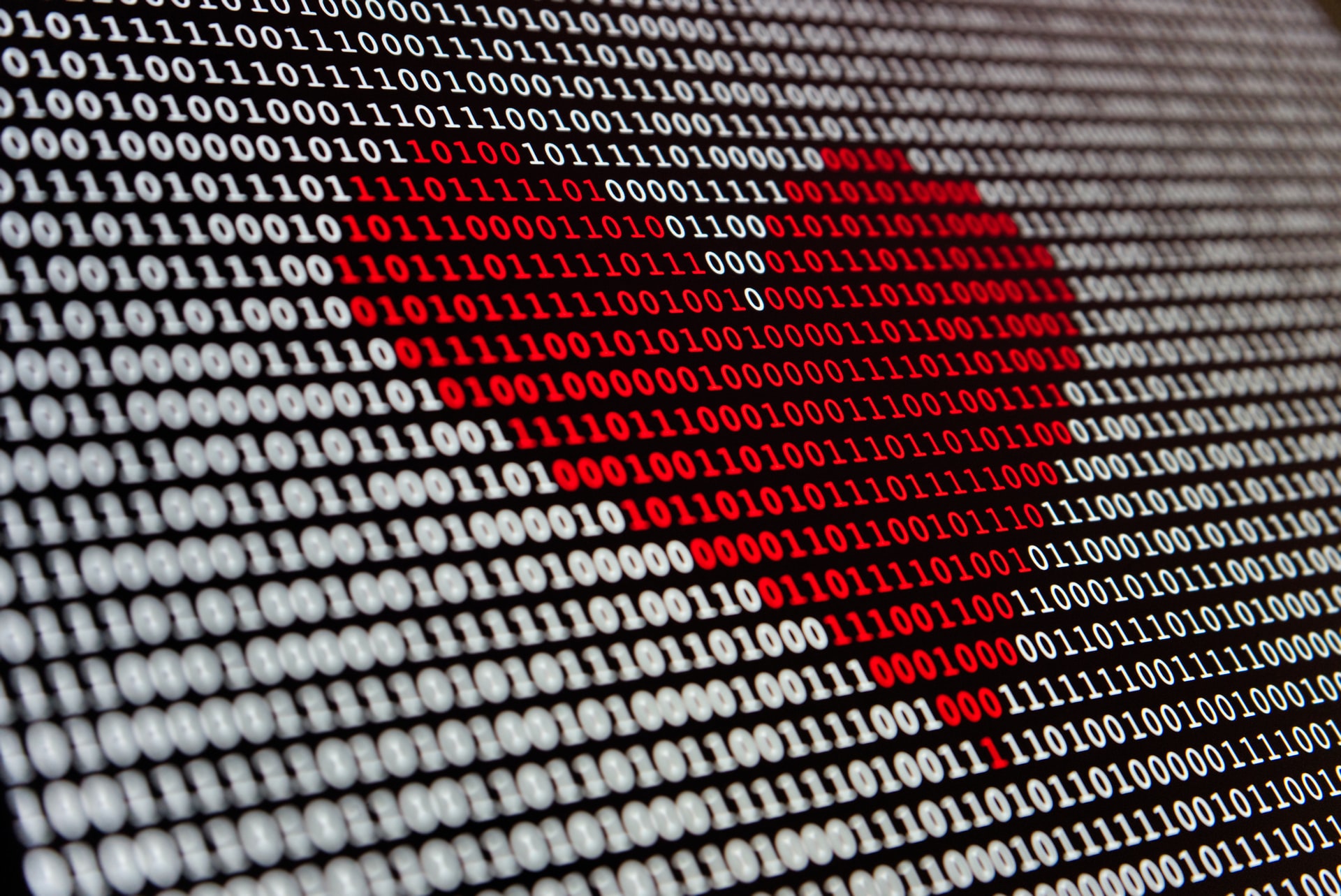 'Code in terminal forming a red heart'